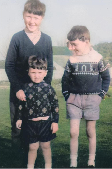 Joan & Phils sons: Philip, David and Brian at the front.